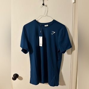 Gymshark shirt - Men’s Large (L). Never worn. Tags still on.